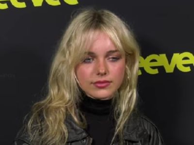 Cora McBride Walling Welliver is wearing a black top and a black leather jacket.